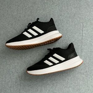 Adidas women’s Black and White Athletic Shoes